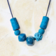 NL12-tue Halskette Nandini Türkis